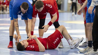 SwitzerlandÕs Manuel Zehnder lies injured on the floor during the Yellow Cup Handball game between Switzerland and Italy in Winterthur, Switzerland, Friday, 03 January 2025. (KEYSTONE/Ennio Leanza)