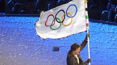 (240811) -- PARIS, Aug. 11, 2024 -- Hollywood star Tom Cruise holds the Olympic flag in a section which sees the Olympic Flag transferred from Paris to the 2028 host city, Los Angeles, during the closing ceremony of the Paris 2024 Olympic Games, Olympische Spiele, Olympia, OS at the Stade de France in Paris, France, Aug. 11, 2024. ) (PARIS2024) FRANCE-PARIS-OLY-CLOSING CEREMONY GaoxJing PUBLICATIONxNOTxINxCHN