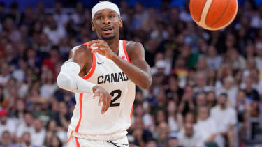 Olympics: Basketball-Men Group A - CAN-AUS Jul 30, 2024; Villeneuve-d Ascq, France; Canada guard Shai Gilgeous-Alexander (2) in action against Australia in a men s group stage basketball match during the Paris 2024 Olympic Summer Games at Stade Pierre-Mauroy. Villeneuve-d Ascq Stade Pierre-Mauroy France, EDITORIAL USE ONLY PUBLICATIONxINxGERxSUIxAUTxONLY Copyright: xJohnxDavidxMercerx 20240730_jel_pb5_2309