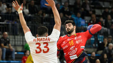 Spain's right back #18 Imanol Garciandia Alustiza vies with Bahrain's left back #33 Hasan Madan during the qualifying handball match for the 2024 Paris Olympic Games between Spain and Bahrain at the Palau d'Esports in Granollers on March 14, 2024. (Photo by Josep LAGO / AFP) (Photo by JOSEP LAGO/AFP via Getty Images)