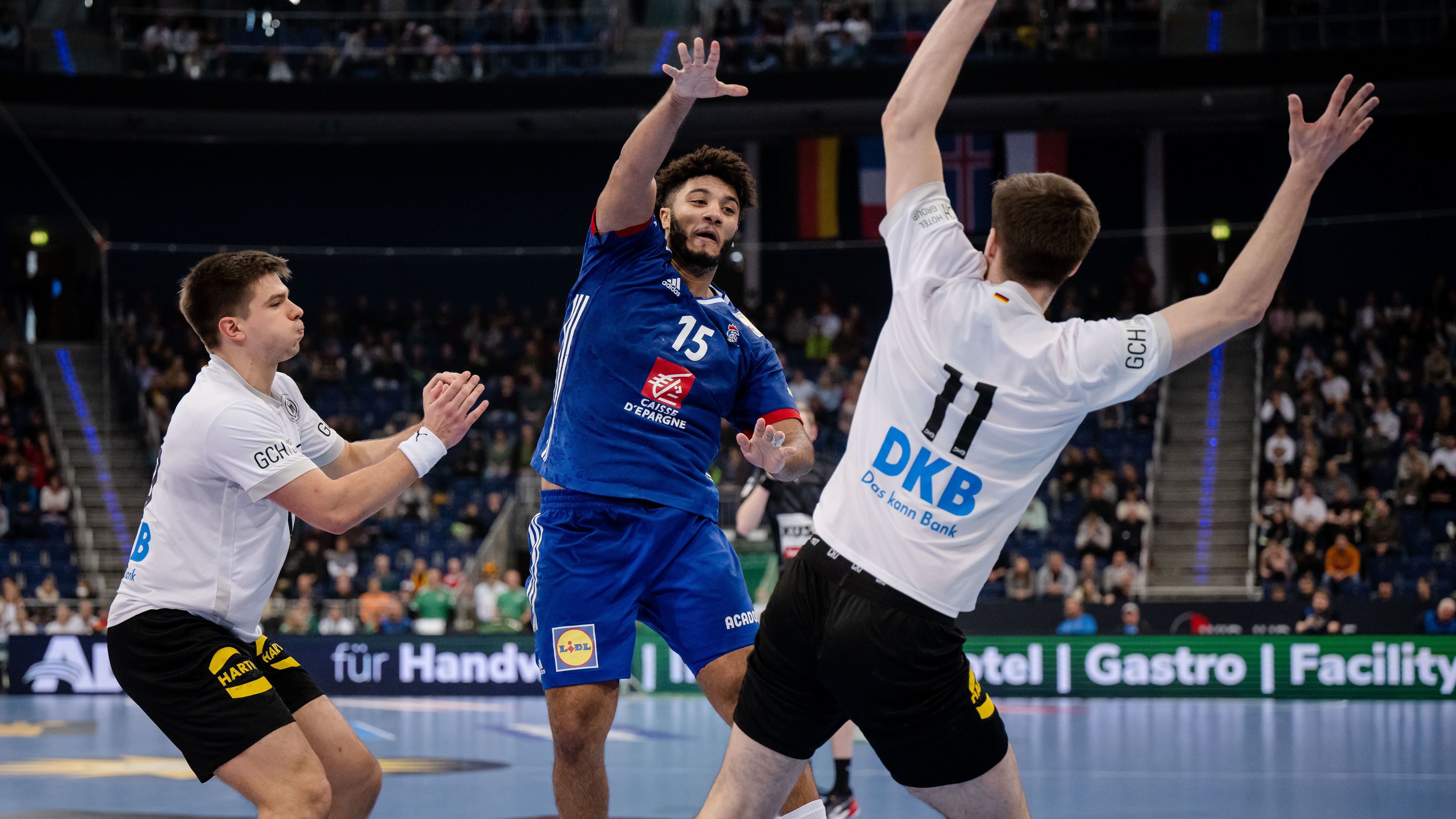 Thibault Chevalier of France is tackled by Felix Eissing (R) and Renars Uscins (L) of Germany the U21 handball international friendly match between Germany and Iceland at ZAG-Arena on January 08, 2023 in Hanover, Germany. (Photo by Marvin Ibo Guengoer - GES Sportfoto/Getty Images)

GES/ Handball/ Freundschaftsspiel: Deutschland - Frankreich, 08.01.2023

Handball: Friendly match: Under-21: Germany vs France, Location, January 8, 2023