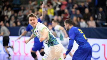 Slovenia's right wing #77 Domen Novak celebatres scoring during the qualifying handball match for the 2024 Paris Olympic Games between Slovenia and Brazil at the Palau d'Esports in Granollers on March 14, 2024. (Photo by Josep LAGO / AFP) (Photo by JOSEP LAGO/AFP via Getty Images)