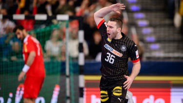 HANOVER, GERMANY - MARCH 17: Lukas Mertens of Germany celebrates a goal during the 2024 IHF Men's Olympic Qualification Tournament match between Austria and Germany at ZAG Arena on March 17, 2024 in Hanover, Germany. (Photo by Marvin Ibo Guengoer - GES Sportfoto/Getty Images)