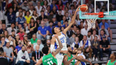 France's #32 Victor Wembanyama goes to the basket in the men's preliminary round group B basketball match between France and Brazil during the Paris 2024 Olympic Games at the Pierre-Mauroy stadium in Villeneuve-d'Ascq, northern France, on July 27, 2024. (Photo by Denis CHARLET / AFP) (Photo by DENIS CHARLET/AFP via Getty Images)