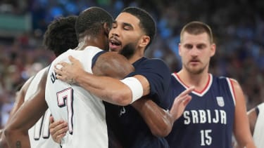 USA's Kevin Durant (7) hugs Jayson Tatum (C) alongside Serbia's Nikola Jokic after beating Serbia 95-91 in the Men's basketball semifinal at the Paris 2024 Olympics at the Bercy Arena in Paris, France on Thursday, August 8, 2024. Photo by Richard Ellis/UPI Photo via Newscom picture alliance