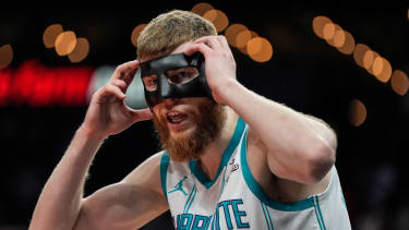 Charlotte Hornets forward Davis Bertans (9) reacts to a call against the Atlanta Hawks during the first half of an NBA basketball game, Wednesday, April 10, 2024, in Atlanta. (AP Photo/Mike Stewart)